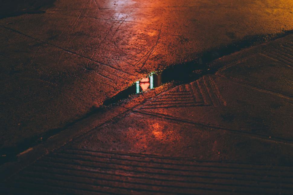 Free Image of A puddle on the ground 