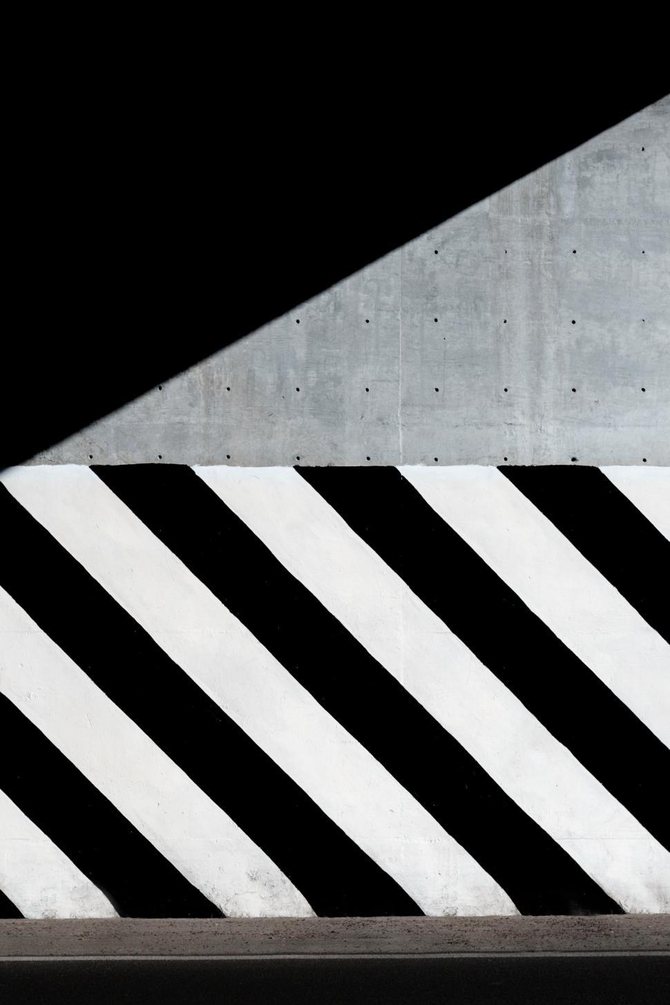 Free Image of black white concrete paint shadow wall city urban road 