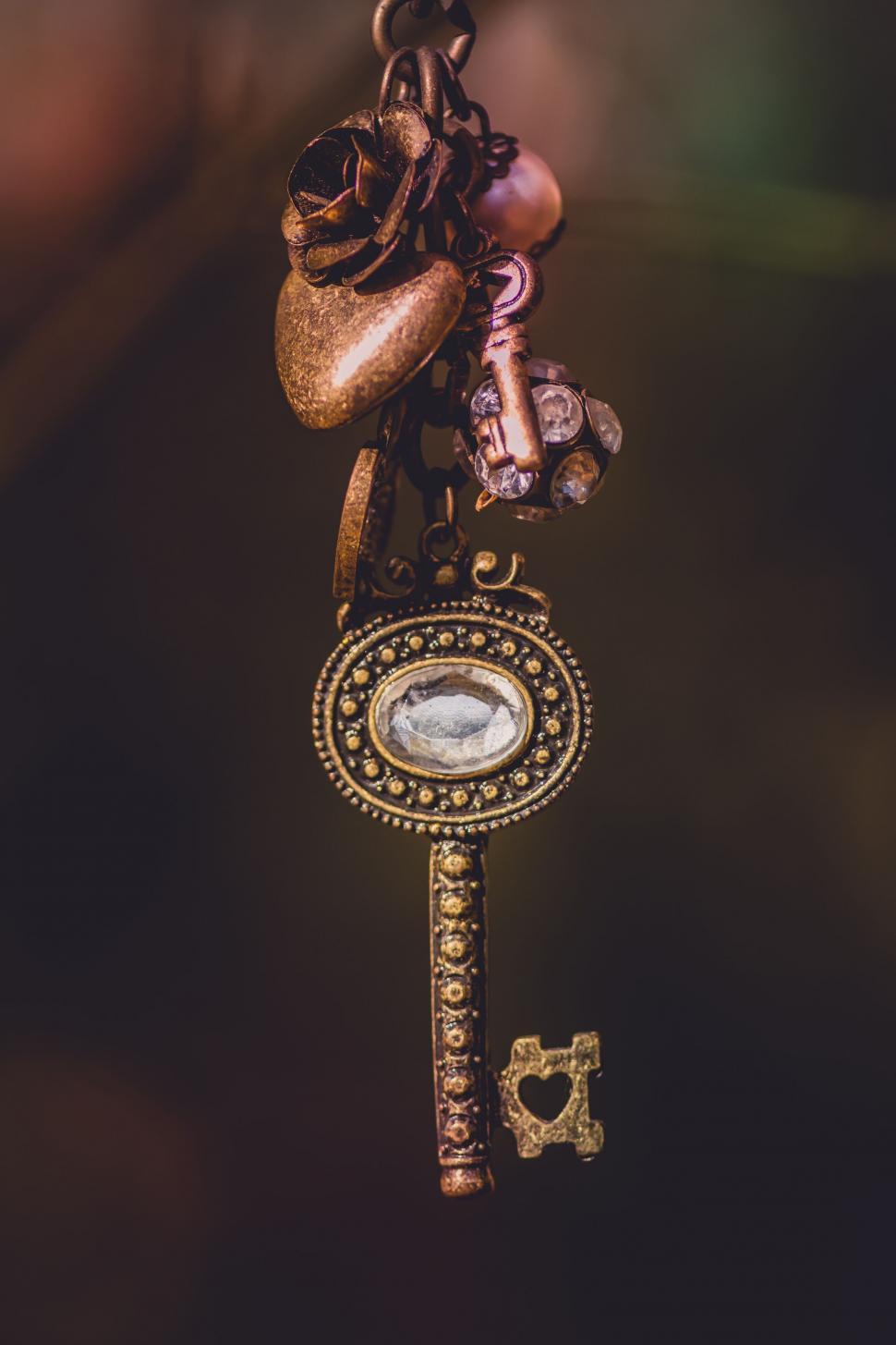 Free Image of A key with a heart and a key chain 
