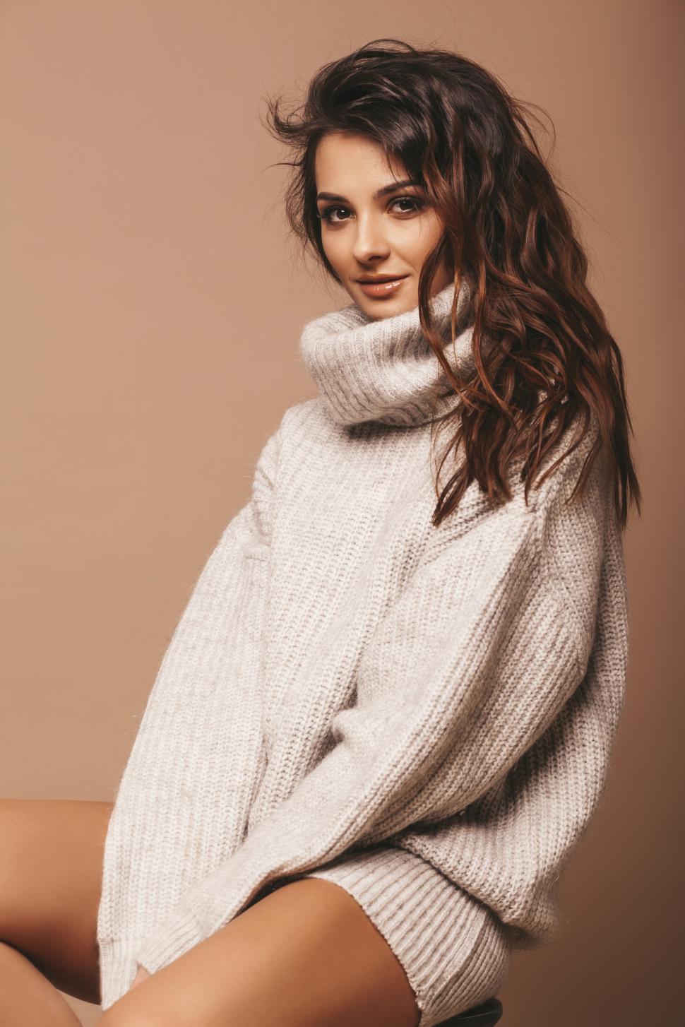 Free Image of A woman in a sweater 