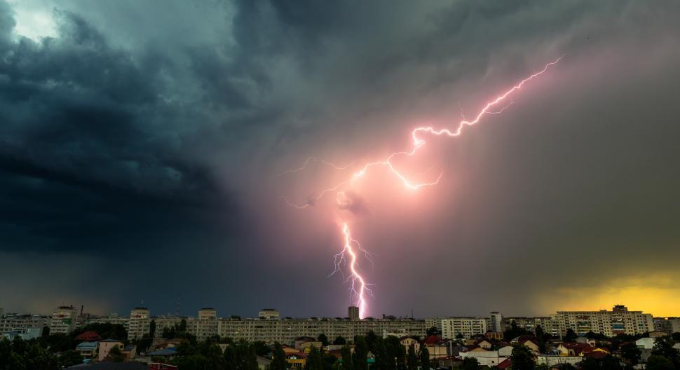 Free Image of Lightning bolt of lightning striking a city 