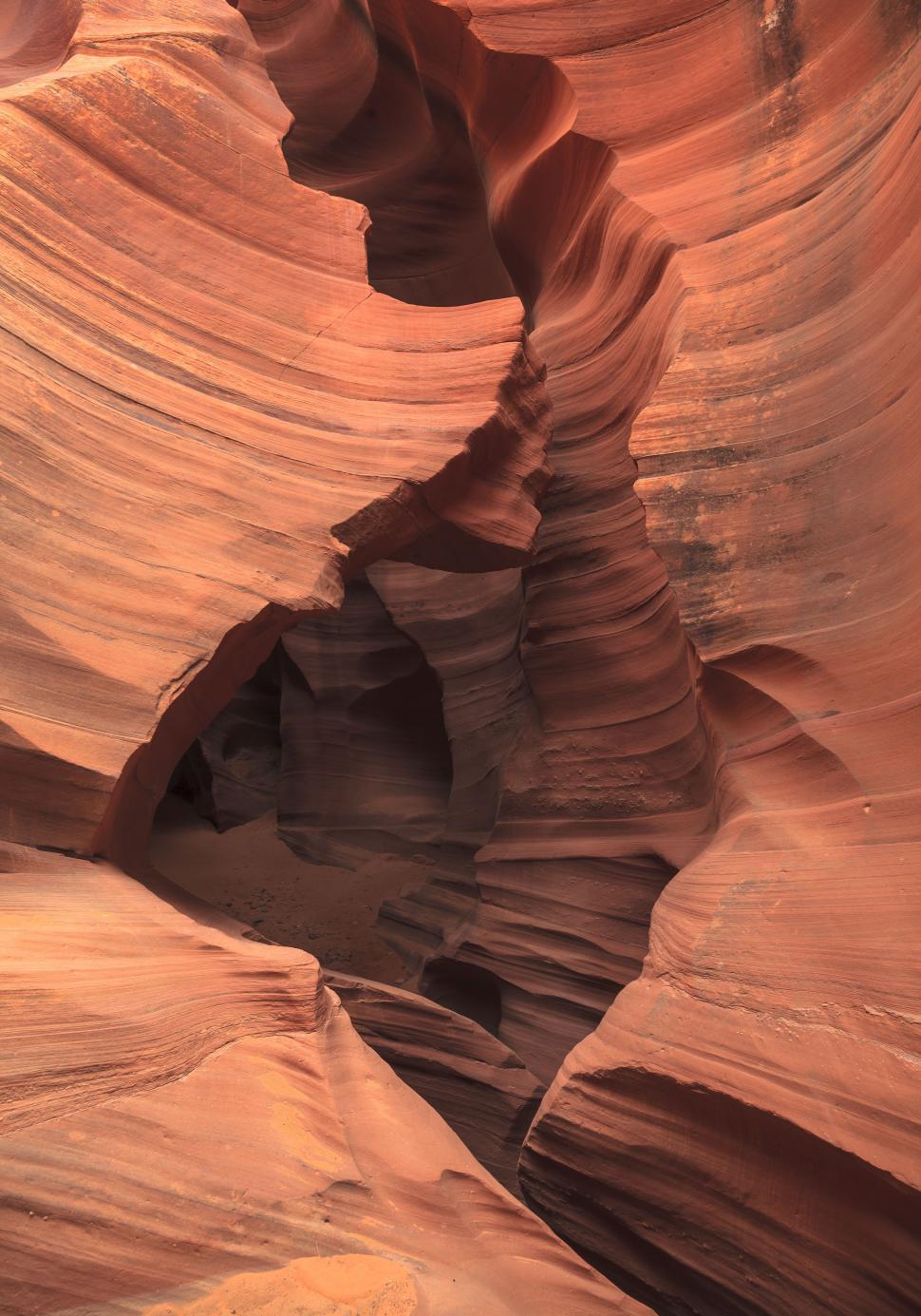Free Image of A large canyon with a hole in it 