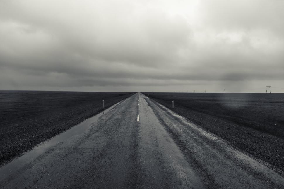 Free Image of A road with rain on the side 