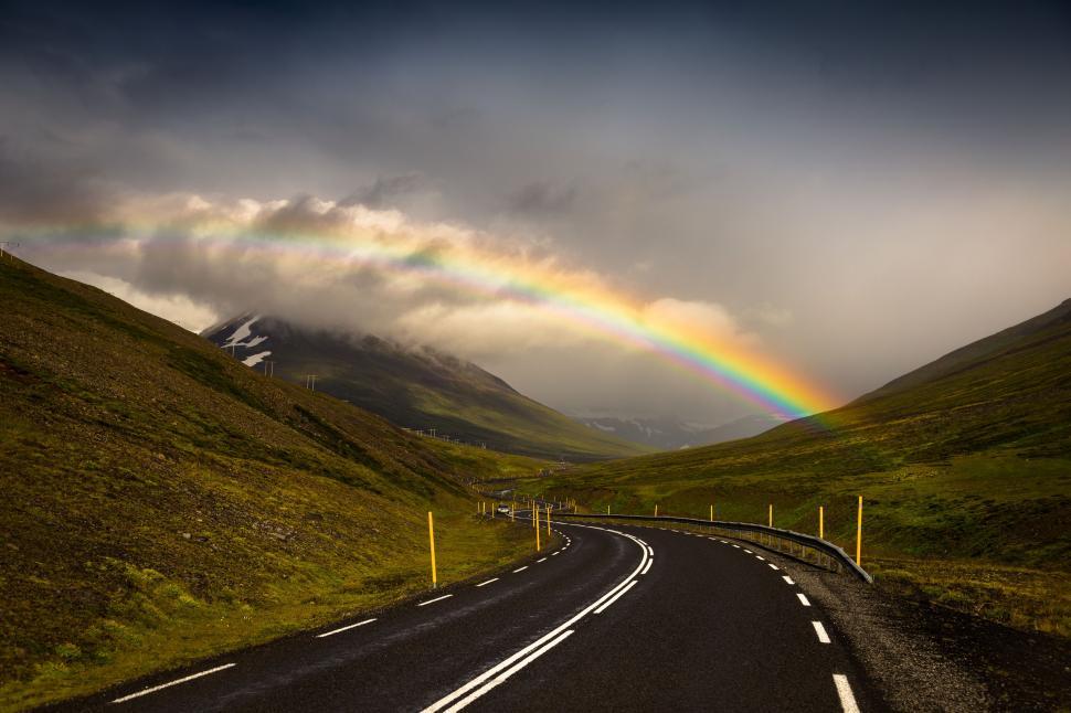 Free Image of A rainbow over a road 