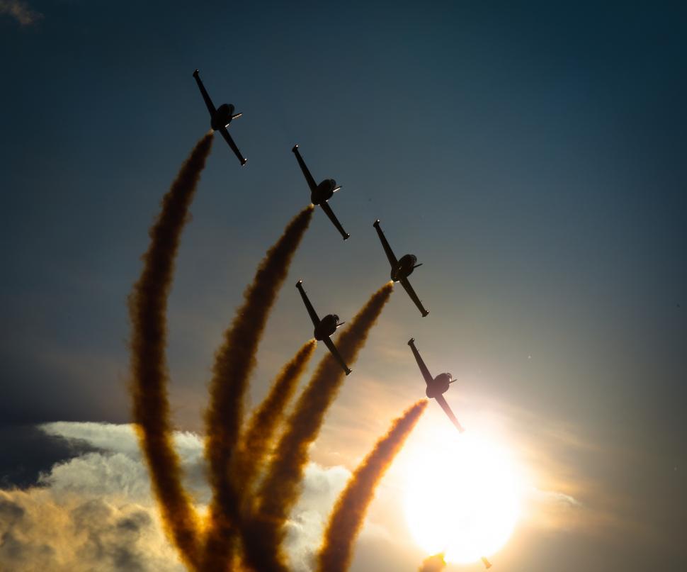 Free Image of A group of airplanes flying in the sky 