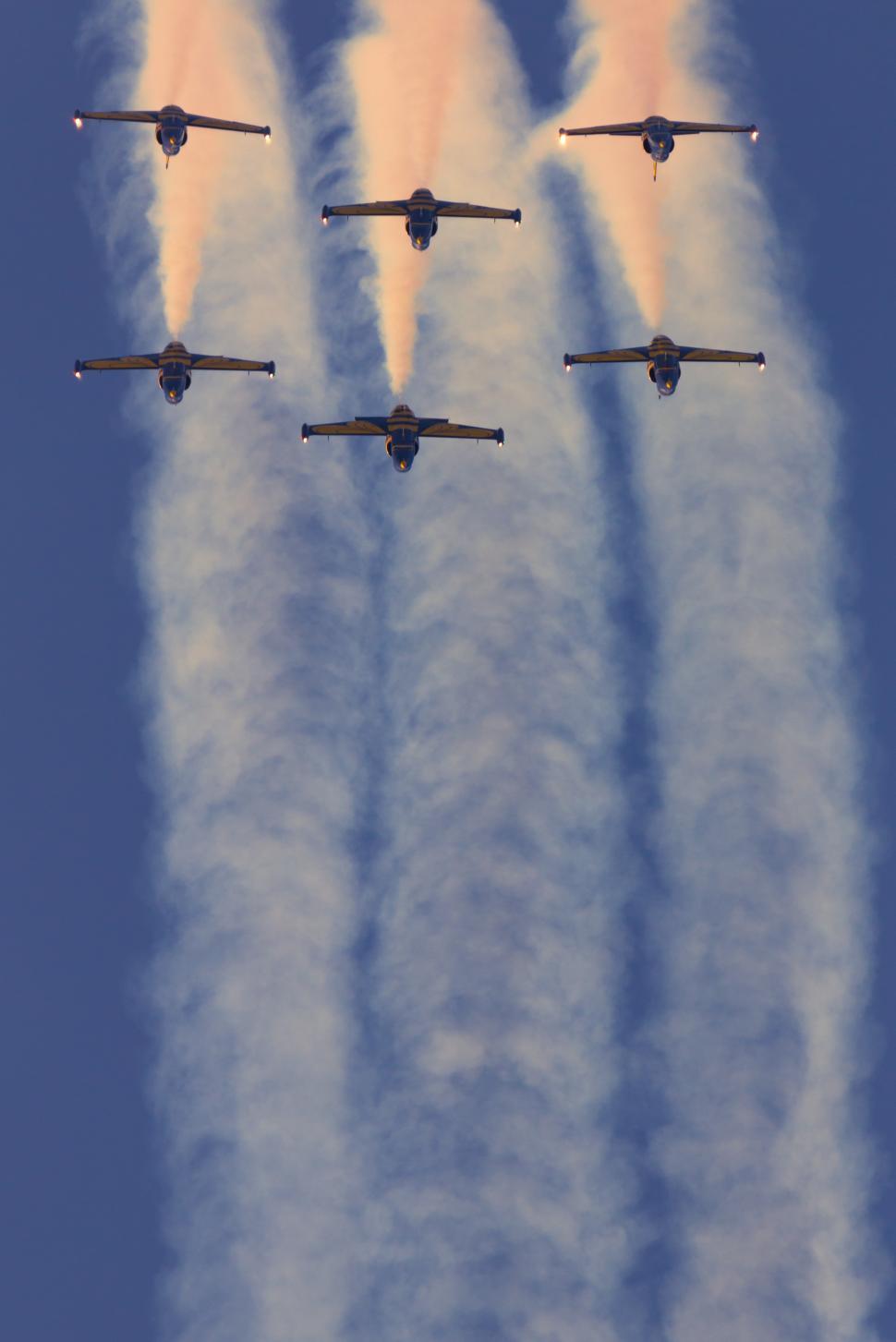 Free Image of A group of jets flying in formation 