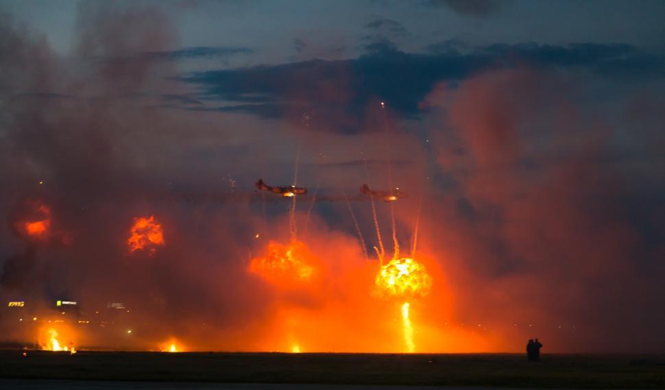 Free Image of A plane shooting a large explosion 