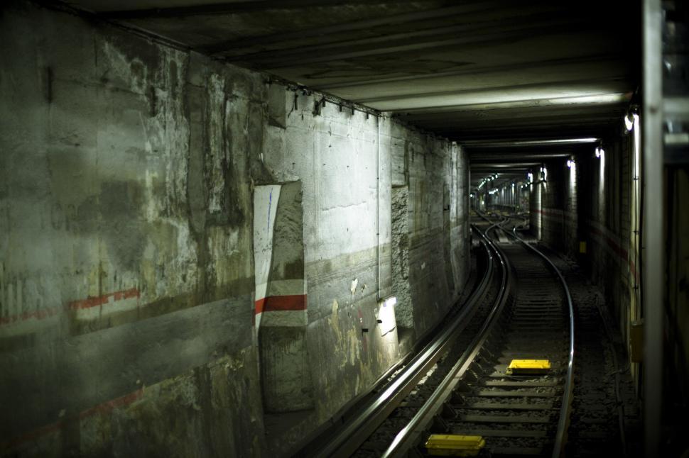 Free Image of A train tracks in a tunnel 