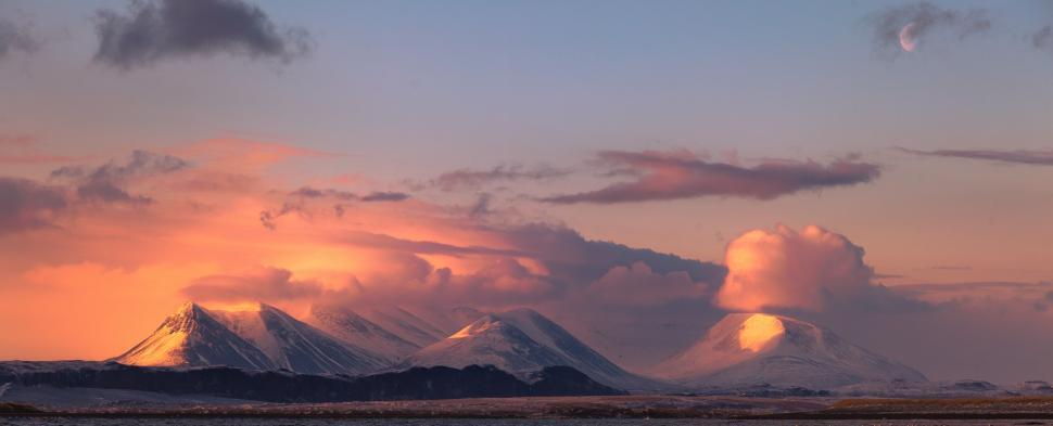 Free Image of A snowy mountains with clouds 