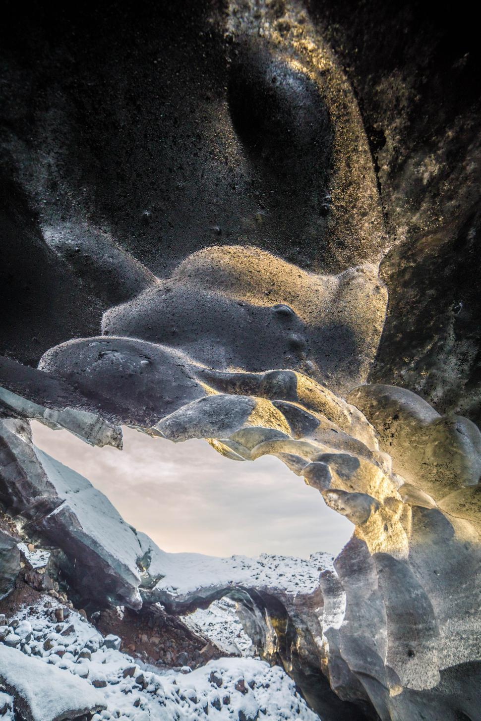Free Image of A cave with snow and ice 