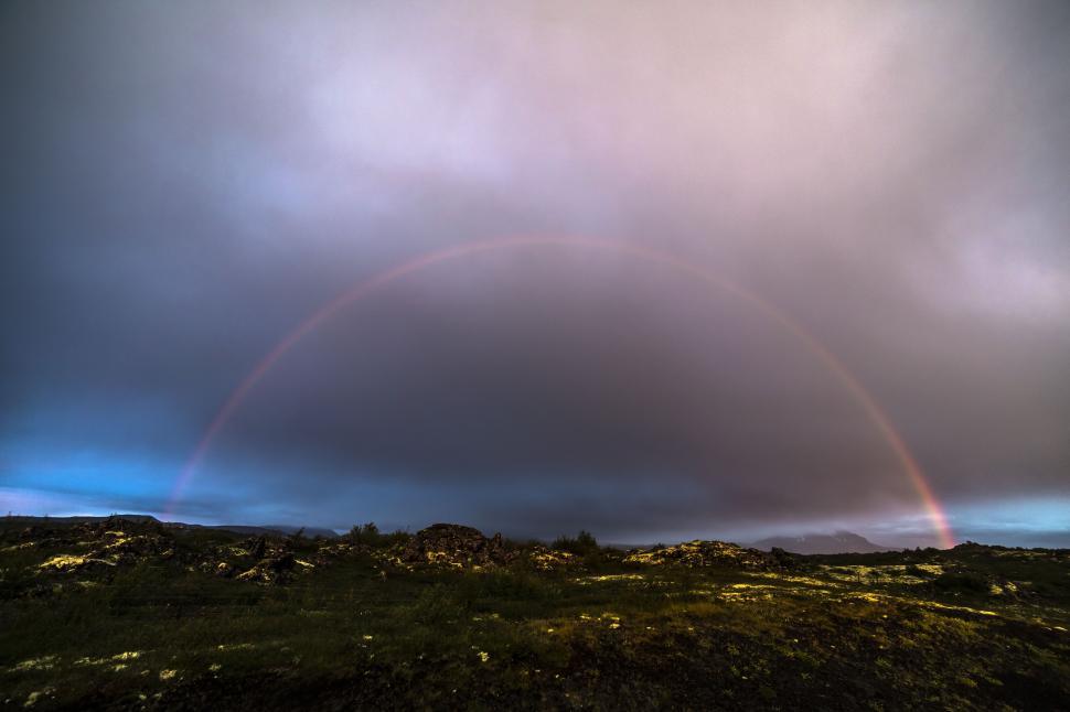 Free Image of A rainbow over a field 