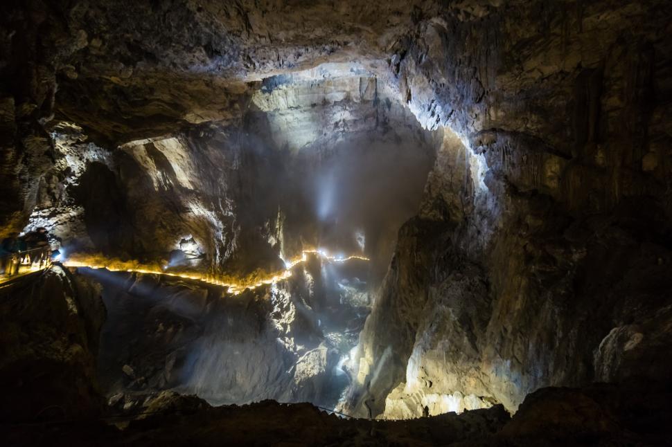 Free Image of A cave with lights and smoke 