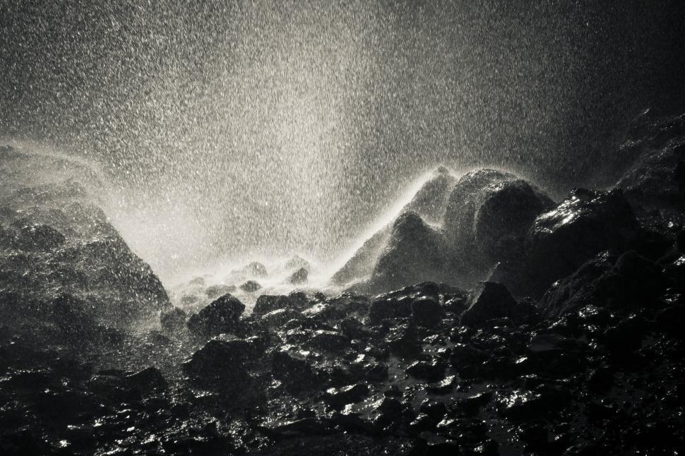 Free Image of A black and white photo of rocks and water 