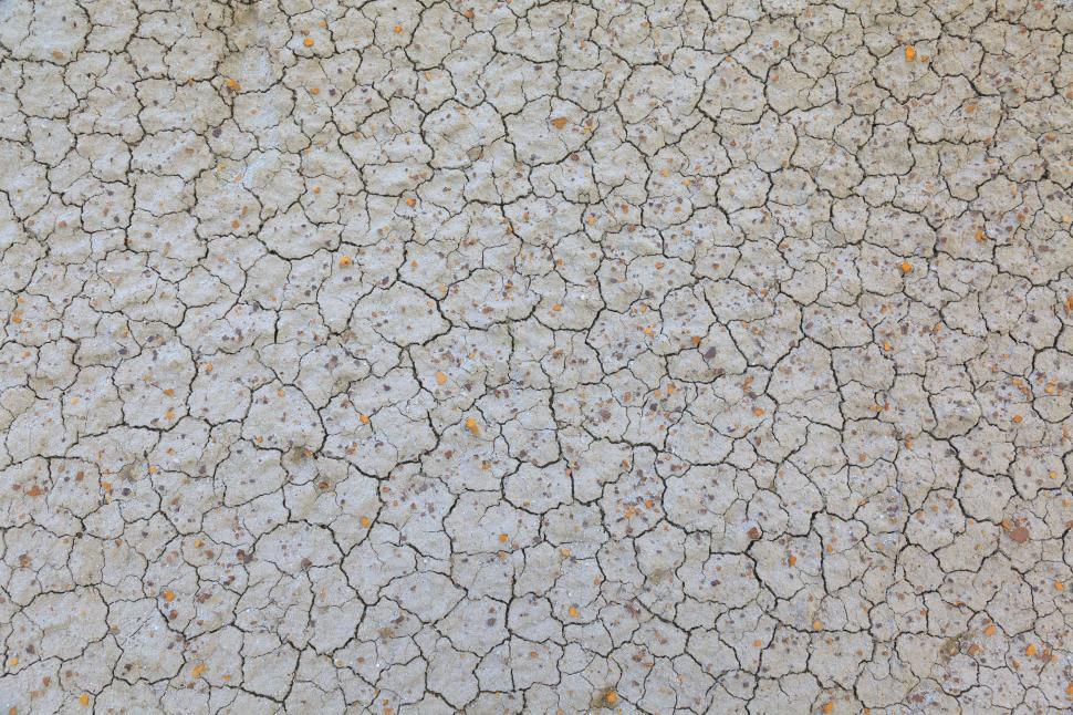 Free Image of A close up of a cracked ground 