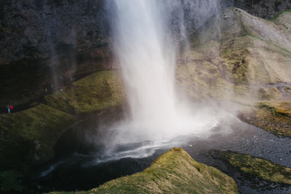 Free Image of A waterfall in a rocky area 