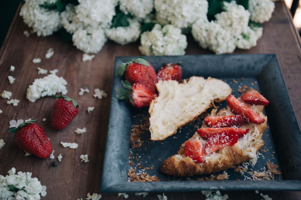 Free Image of A plate of food with strawberries on it 