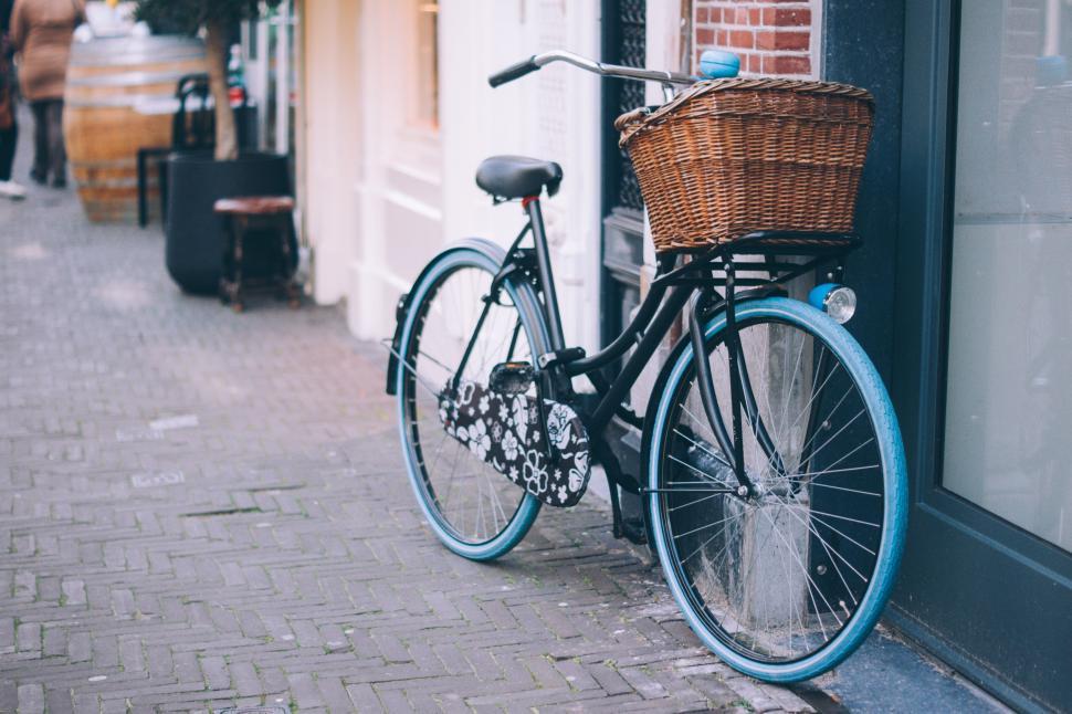 Free Image of A bicycle with a basket on the back of it 