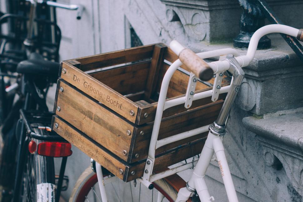 Free Image of A bicycle with a wooden crate on the front 