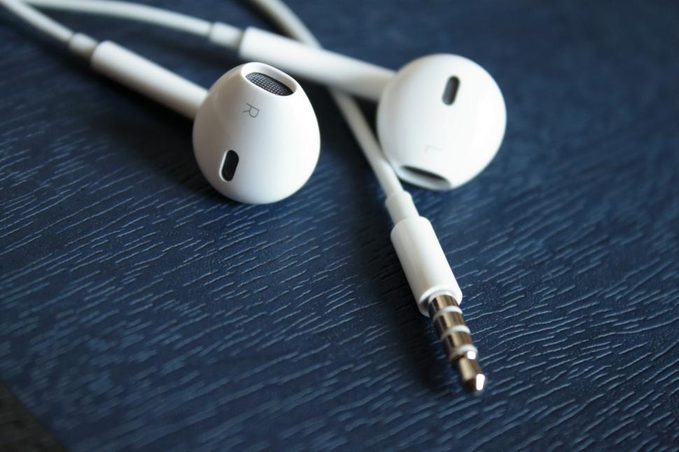 Free Image of A pair of white earbuds 