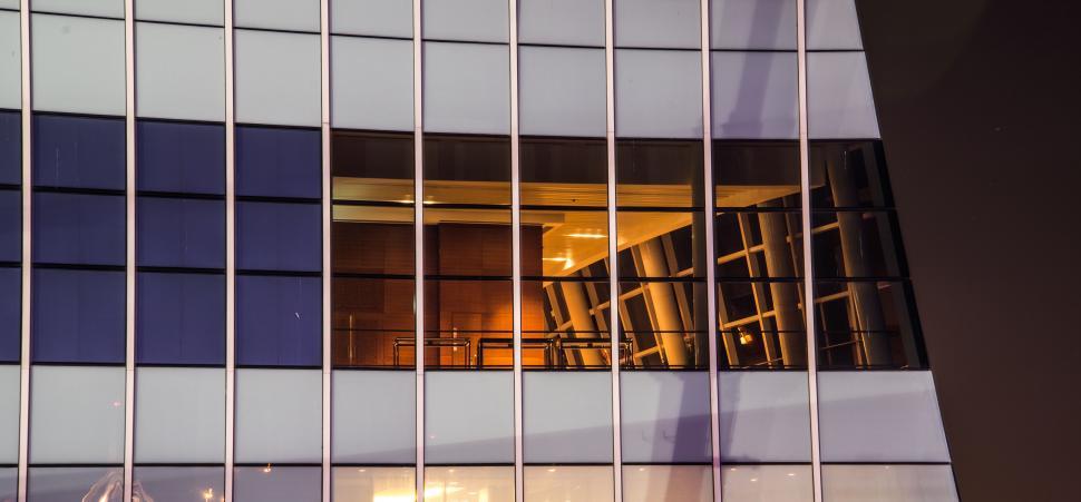 Free Image of A building with windows and a glass wall 