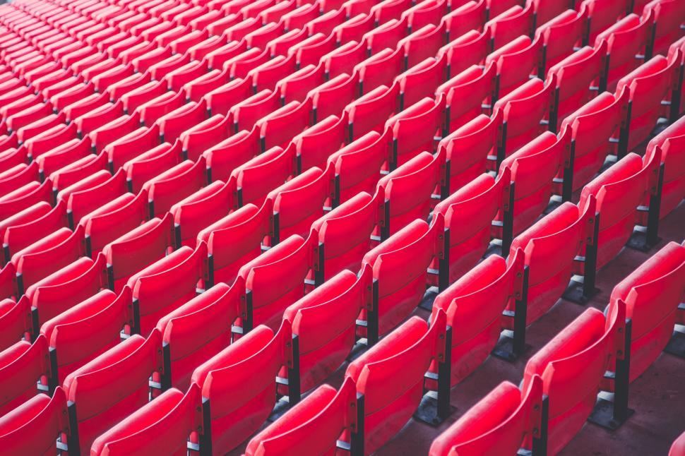 Free Image of Rows of red seats in a stadium 