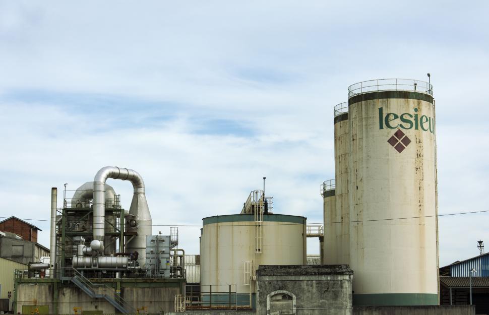 Free Image of A large white and green silos 