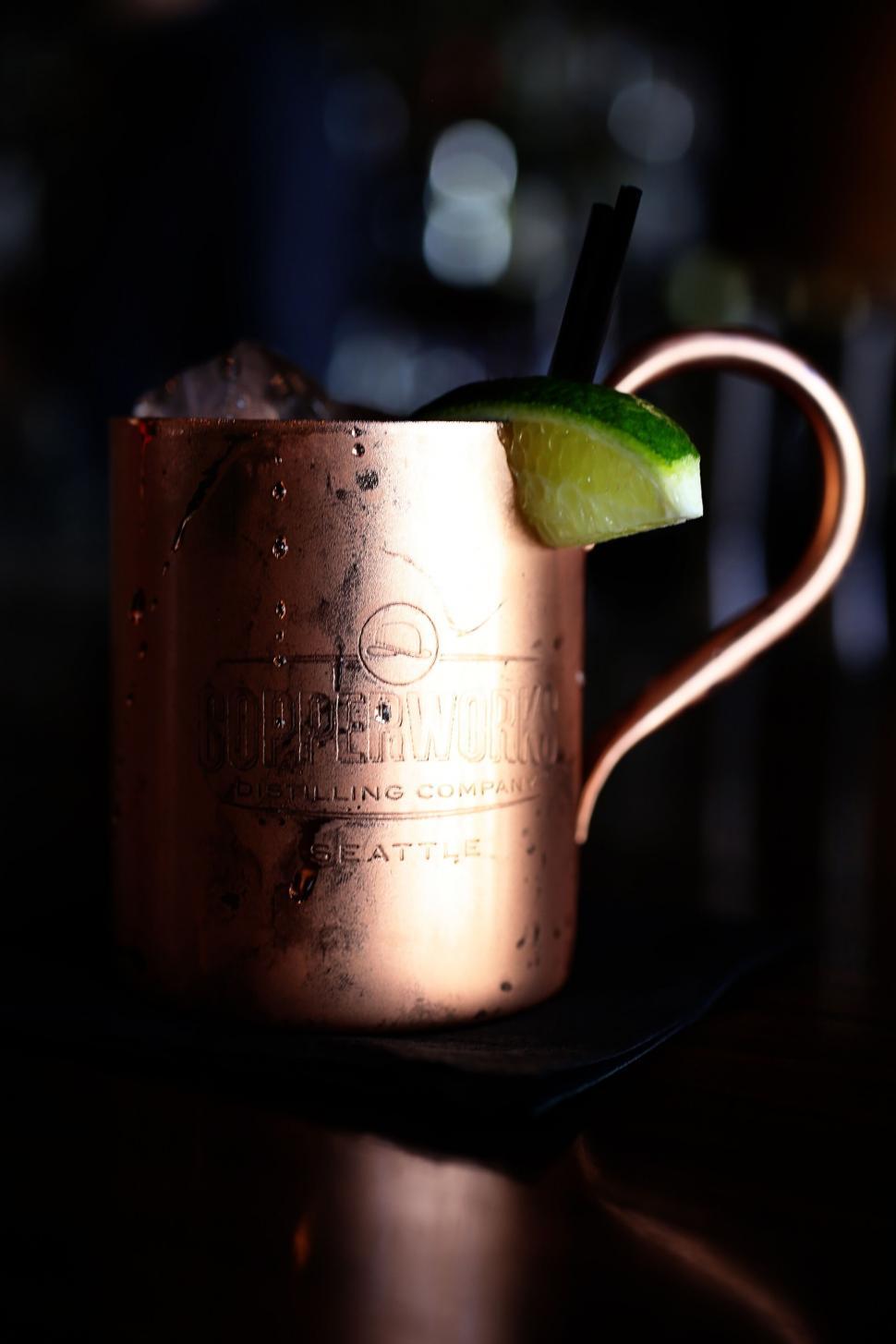 Free Image of A copper mug with a lime wedge on top of it 