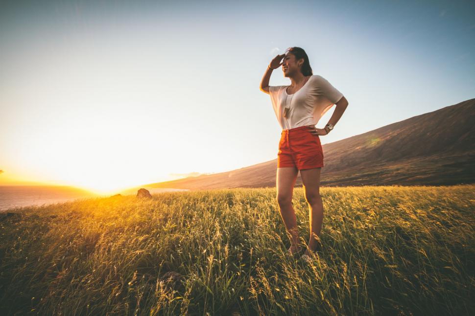 Free Image of A woman standing in a field 
