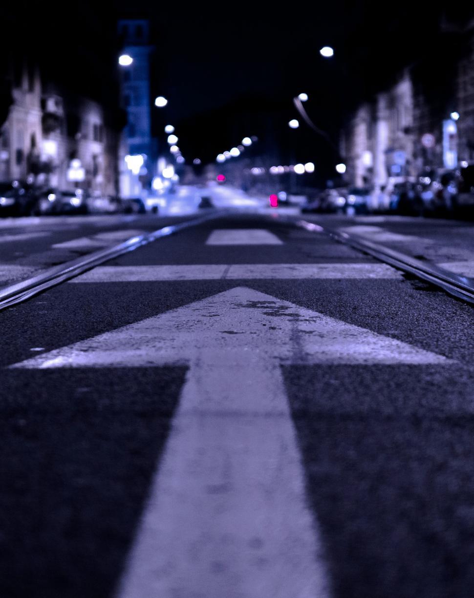 Free Image of A street with a arrow on it 