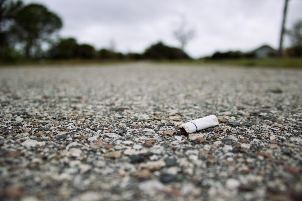 Free Image of A cigarette on the ground 