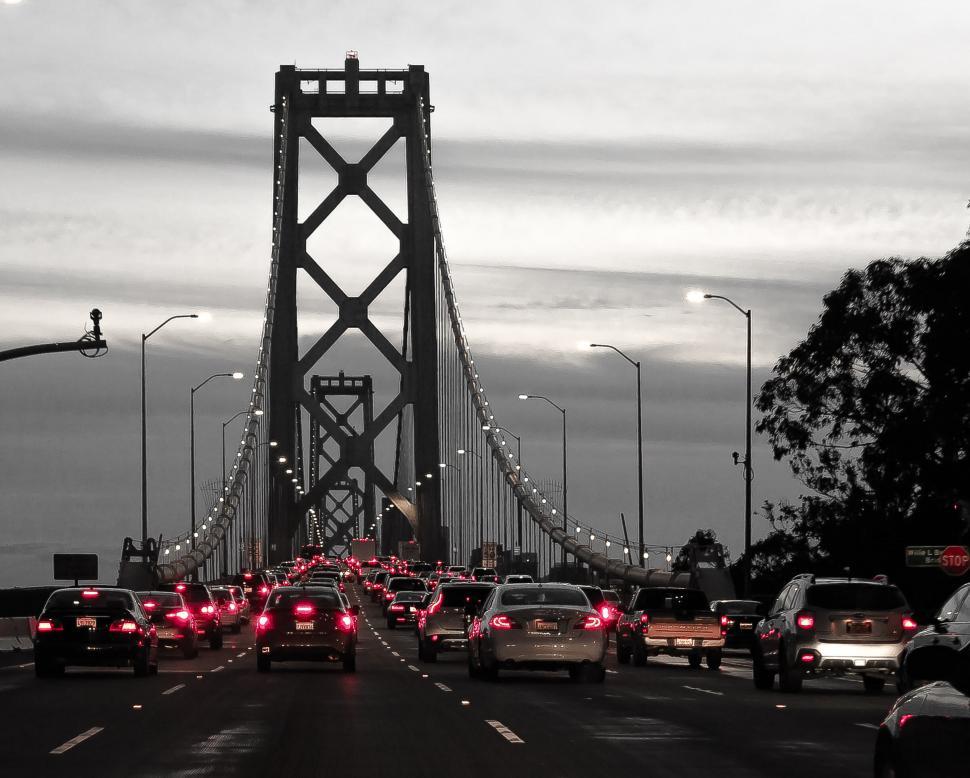 Free Image of A bridge with cars and lights 
