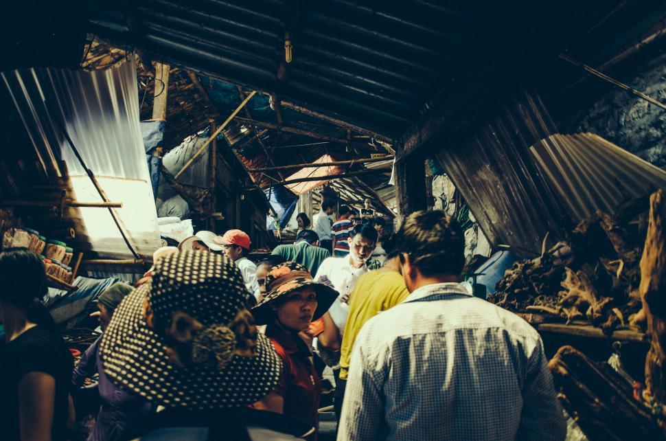 Free Image of A group of people in a market 