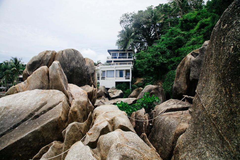 Free Image of A house on a rocky beach 