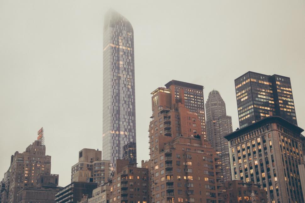 Free Image of A group of tall buildings in a city 