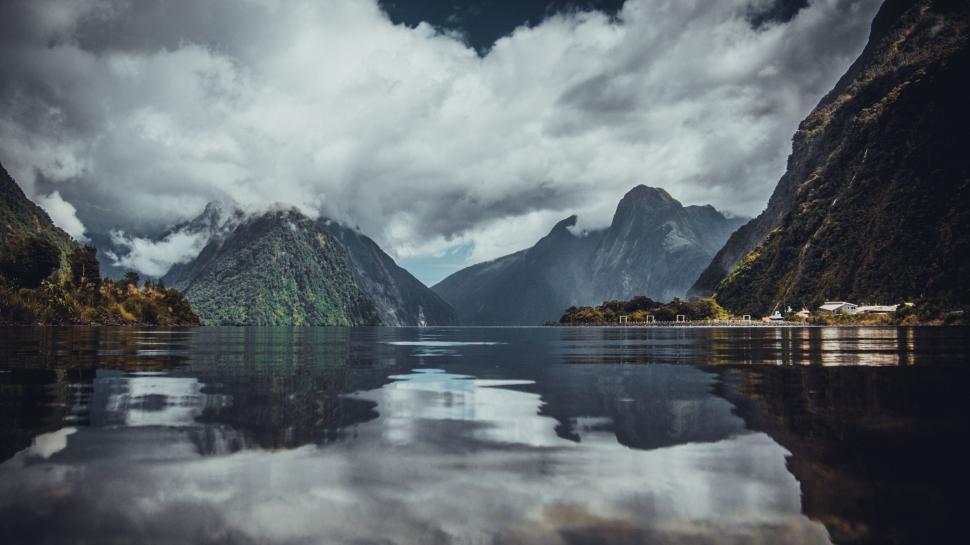 Free Image of Majestic Mountains Overlooking Body of Water 