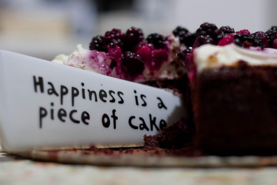 Free Image of A piece of cake with a sign 