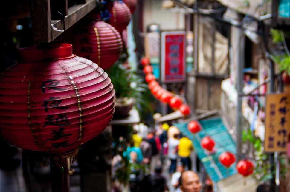 Free Image of A red lanterns from a building 