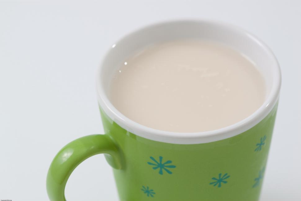 Free Image of Green Coffee Mug on White Background 