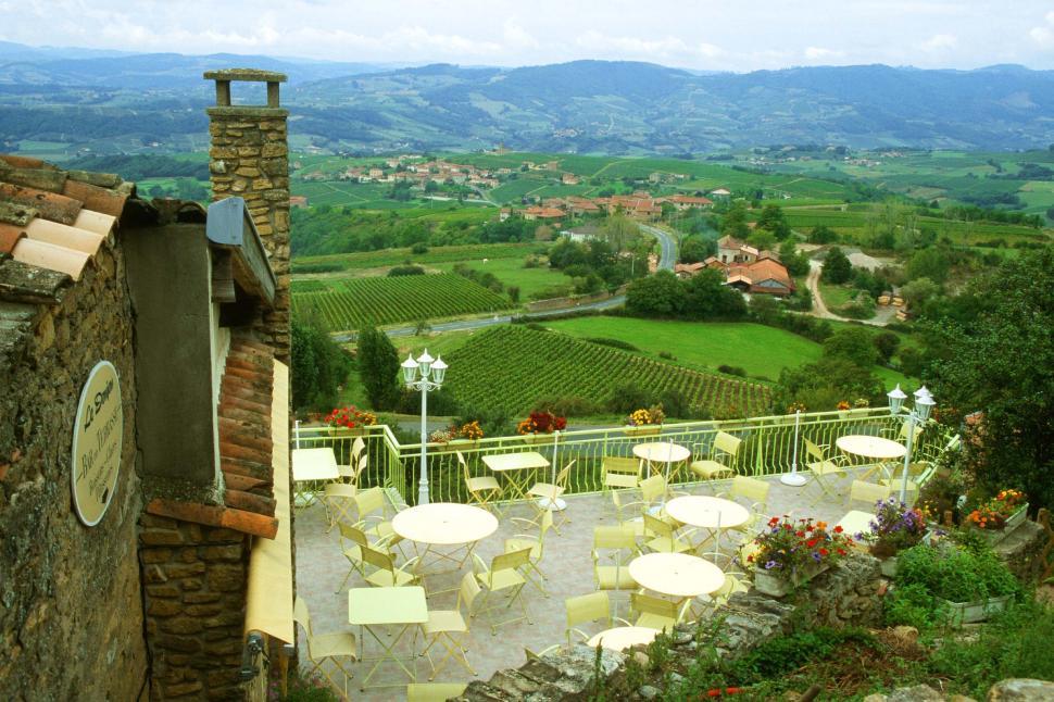 Free Image of Countryside overview with patio tables 