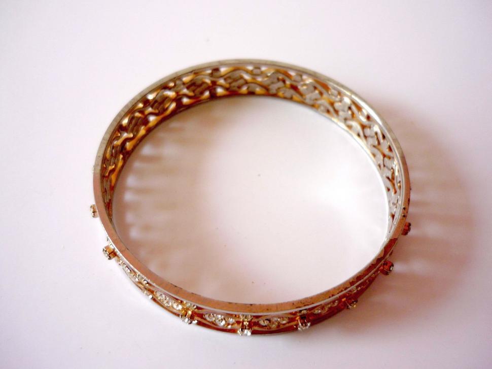 Free Image of Close Up of a Ring on a White Surface 