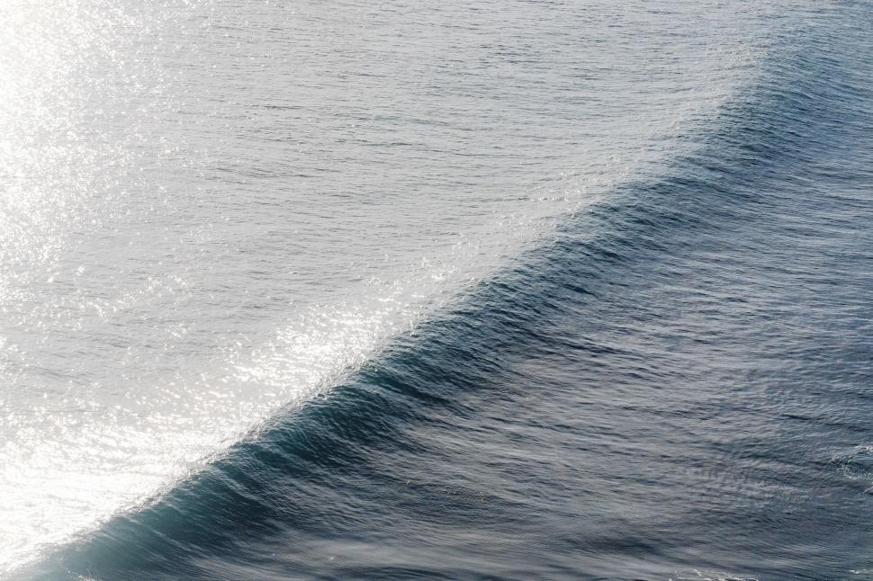 Free Image of A wave of water with a wave 