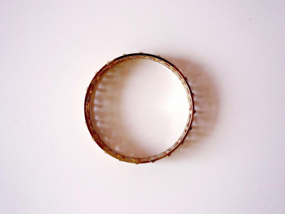 Free Image of Ring Resting on White Surface 