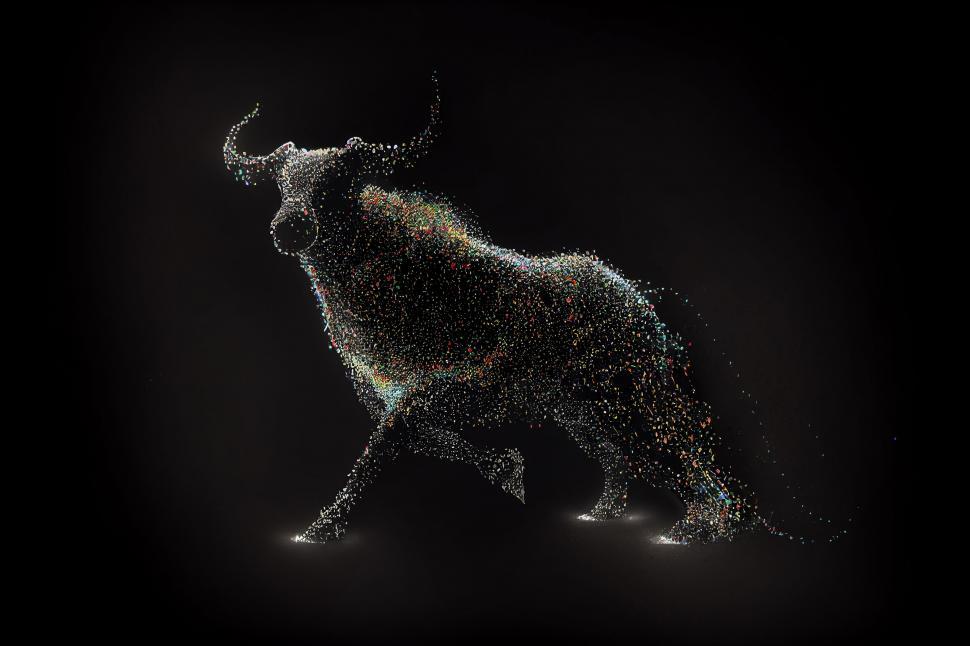Free Image of Abstract digital bull made of multicolored particles 
