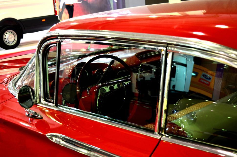 Free Image of Vintage red car with reflections 