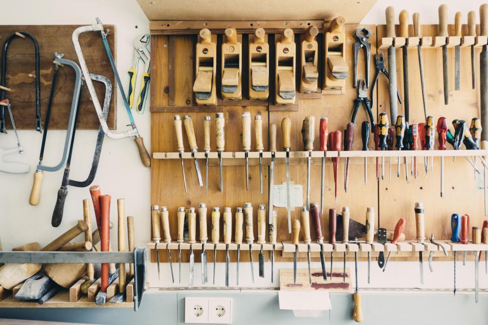 Free Image of Organized workshop with tools hanging 