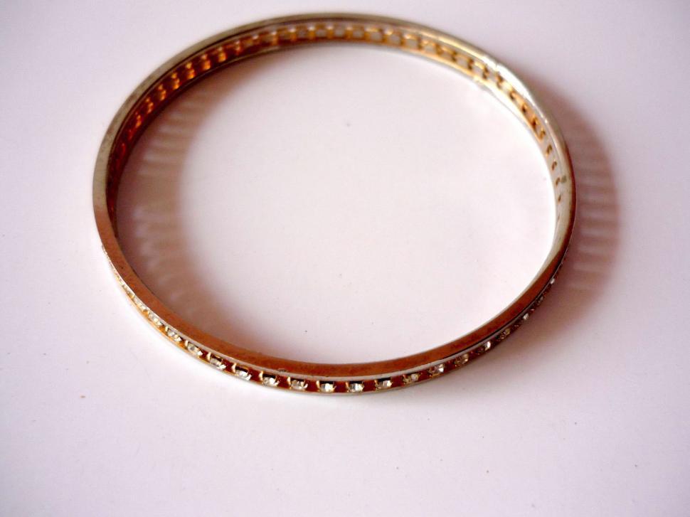 Free Image of Close Up of a Ring on a White Surface 