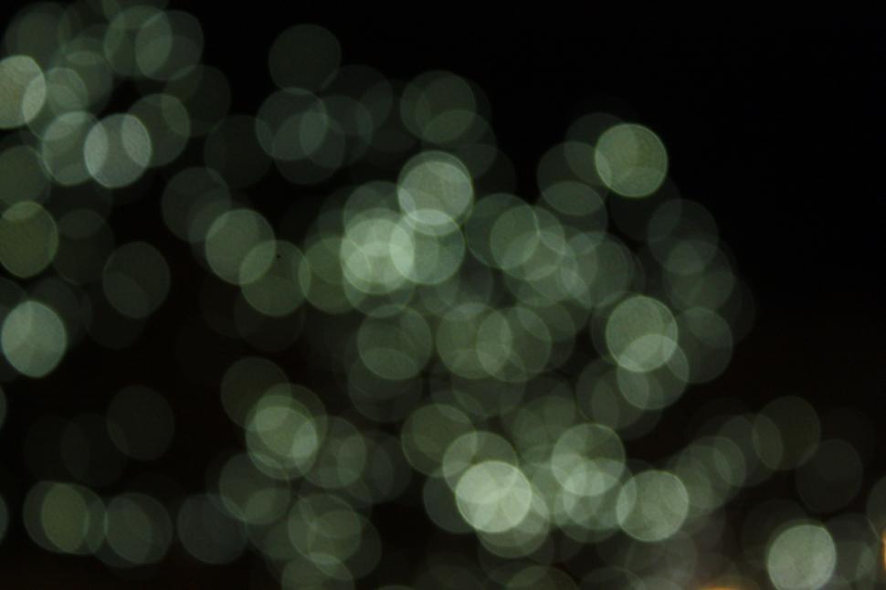 Free Image of Abstract green and yellow bokeh light spots 