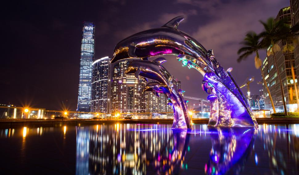 Free Image of Illuminated dolphin statues in Hong Kong 
