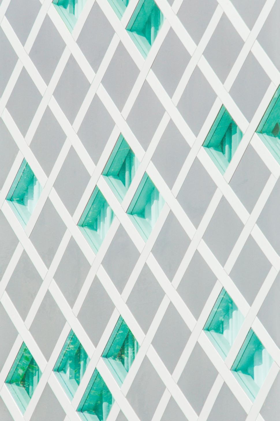 Free Image of Geometric pattern of turquoise windows 