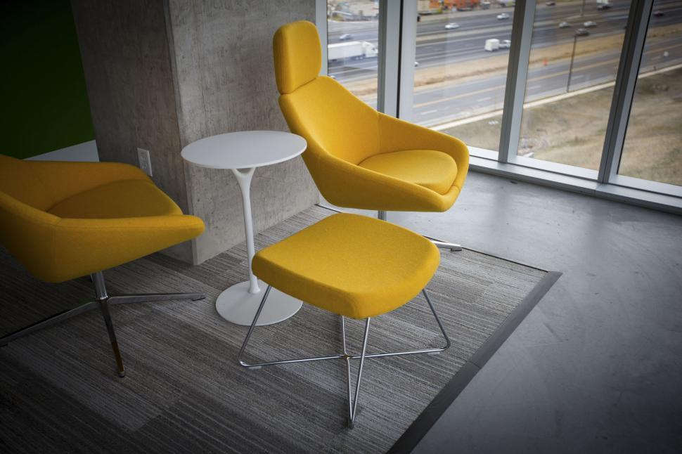 Free Image of Modern yellow chairs in a minimalist room 